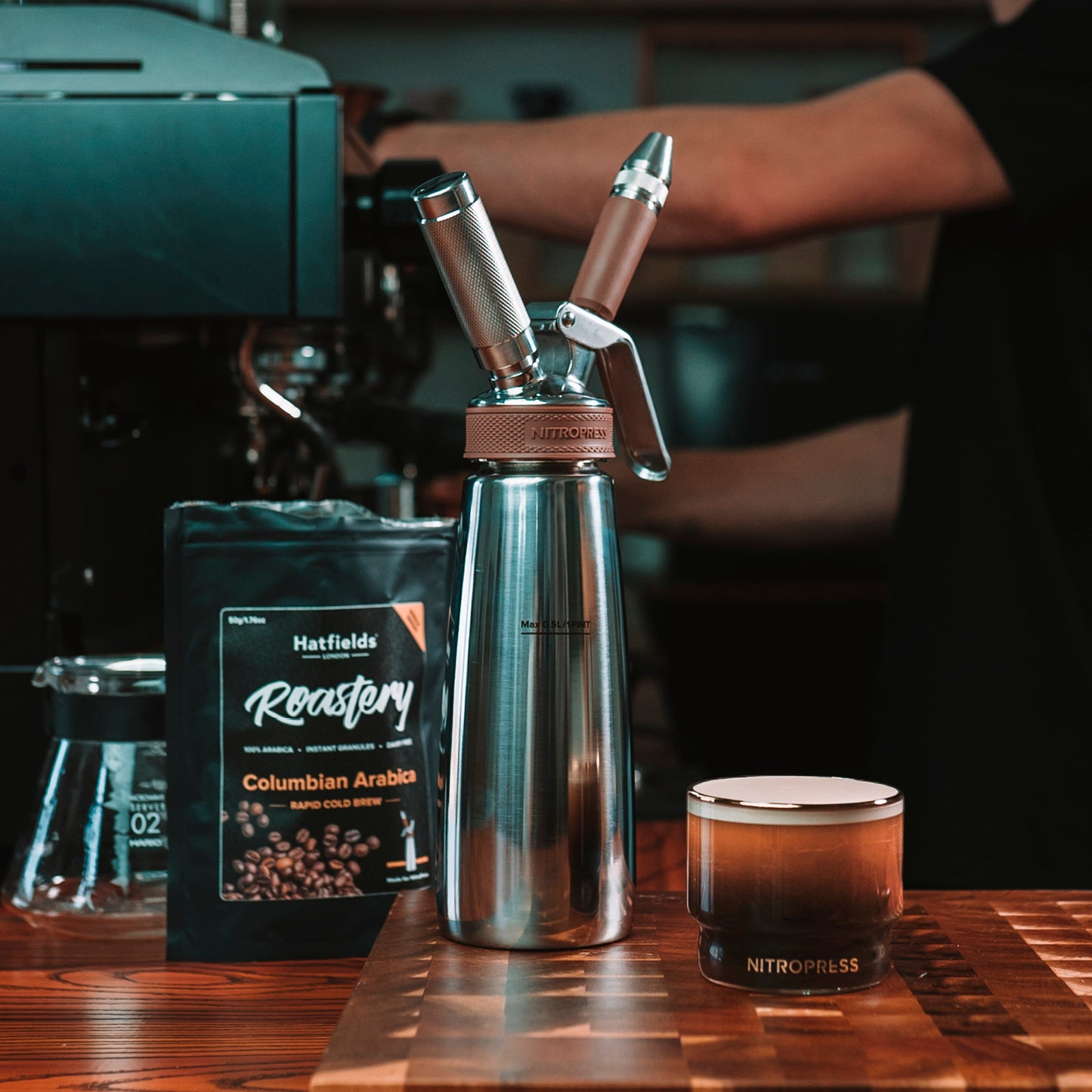 NitroPress roastery and nitro whipper next to espresso machine